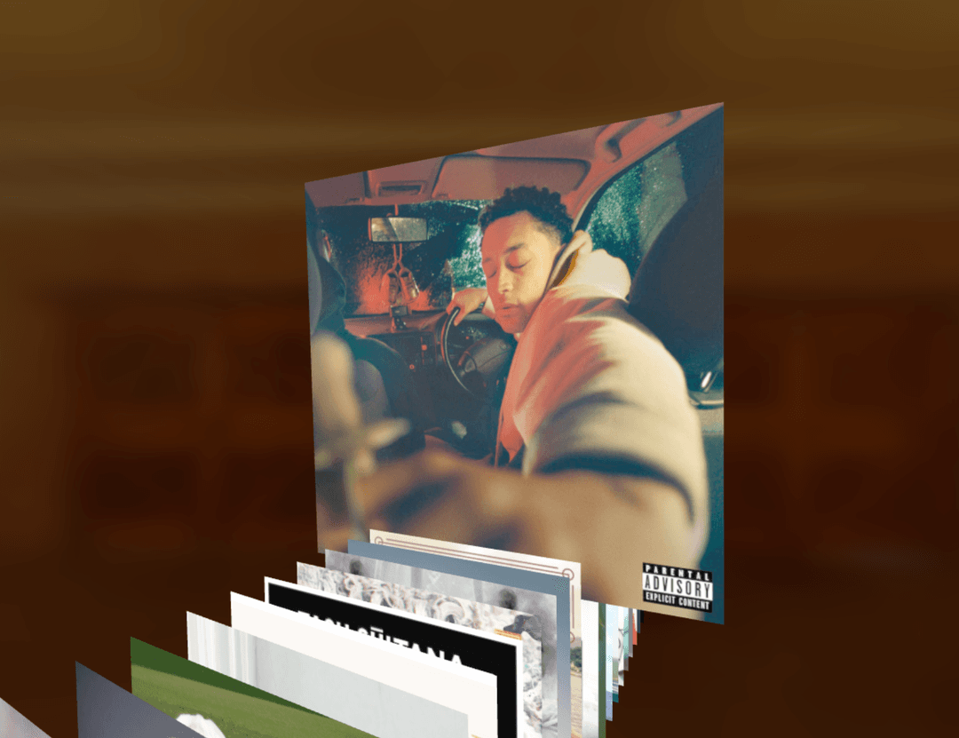 Album covers lined up in perspective. One Album is elevated and scaled.