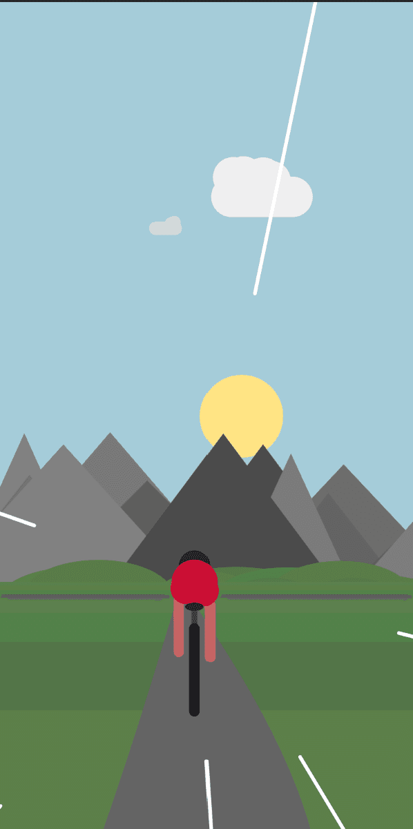 Cyclist on a road towards mountains.