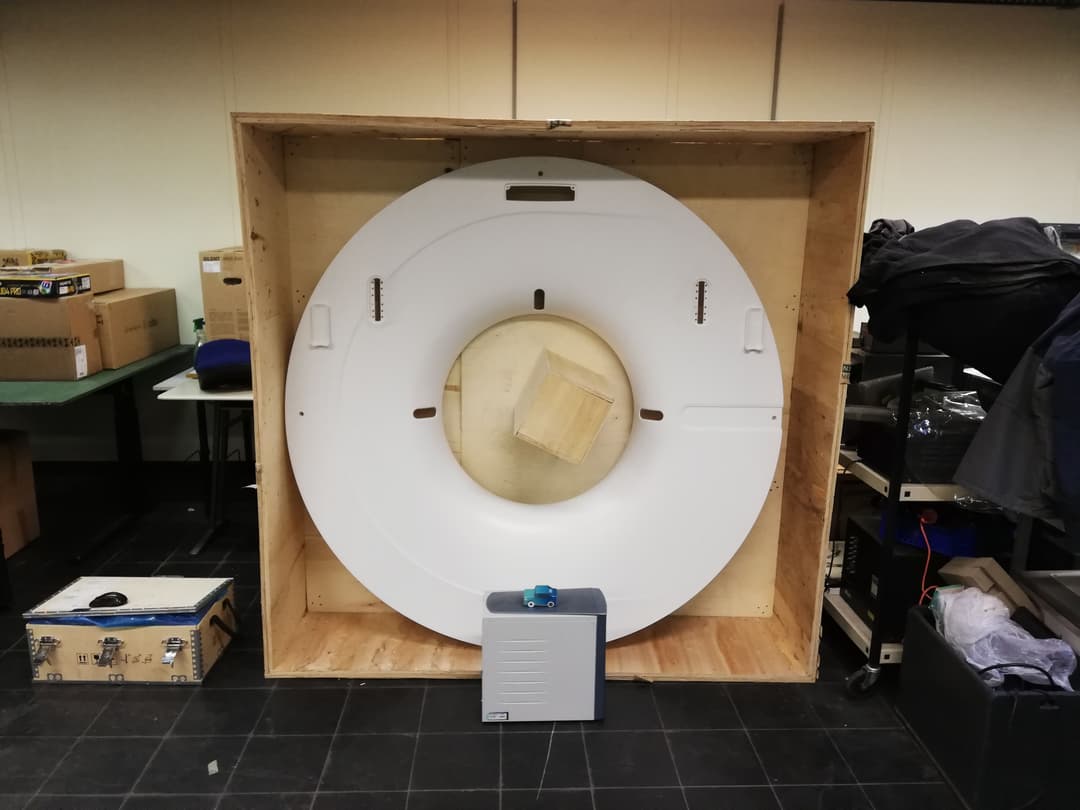 A CT frame in a wooden box.