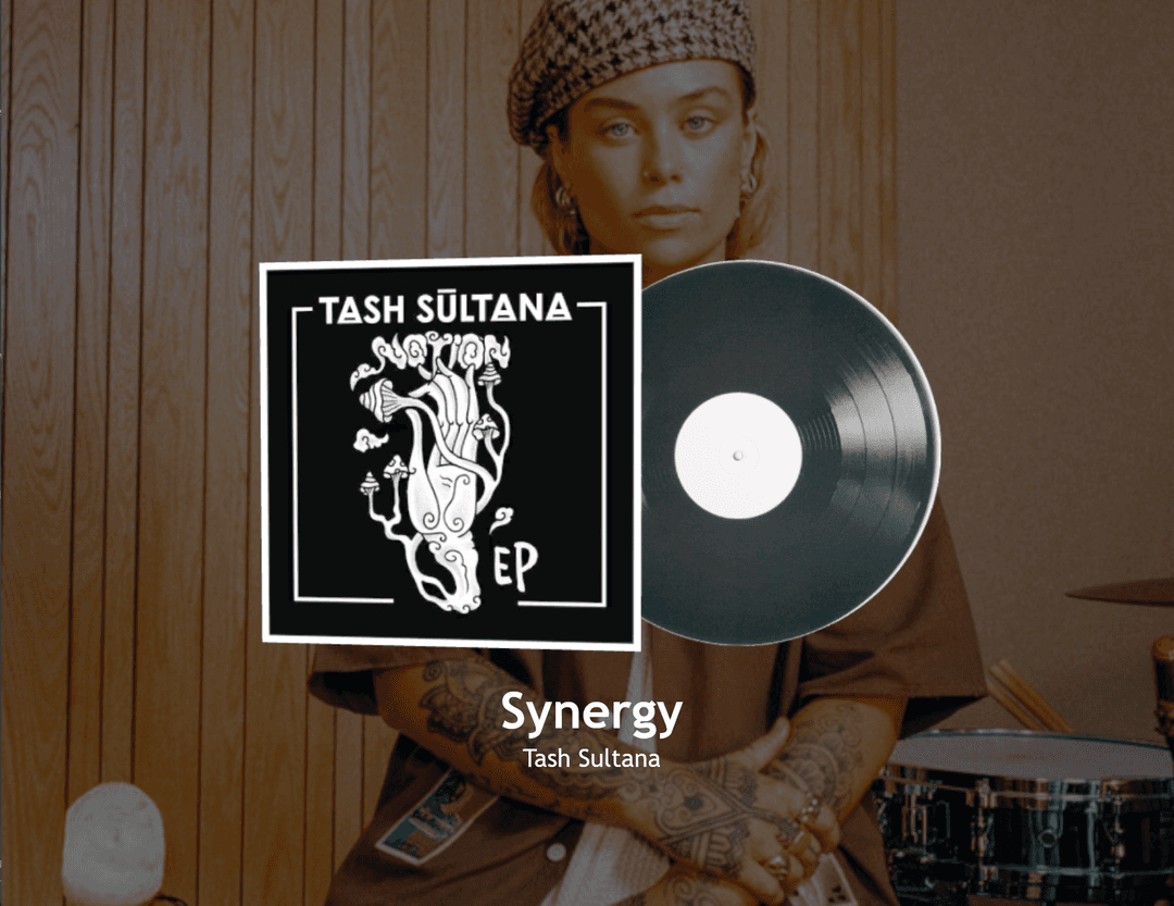 Album and a record are in the foreground. In the background the image of the artist is displayed. Under the album the name of the track and the artist names are displayed.